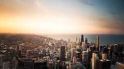 Keluarga menikmati senja di tepi perairan sekitar Medan | Sumber: Lorem Picsum (unsplash photos)